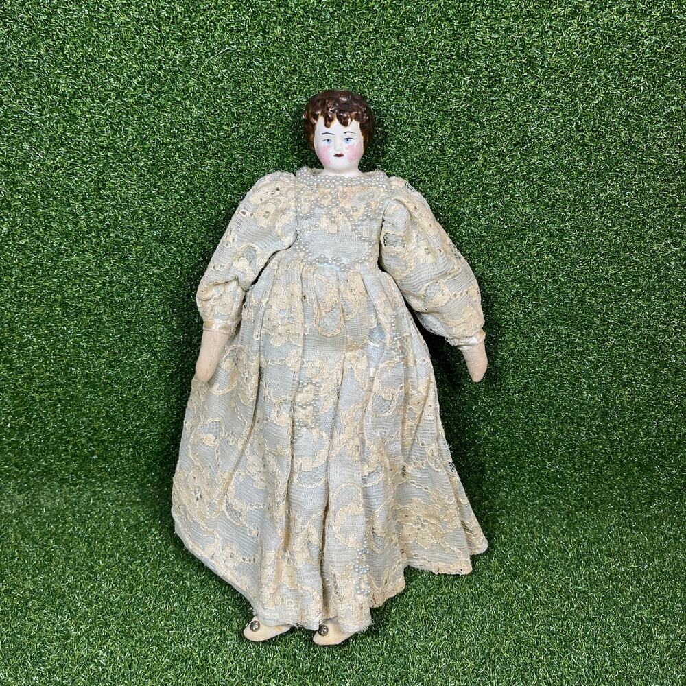 Vintage Porcelain China Head Doll wearing Beaded Lace Dress